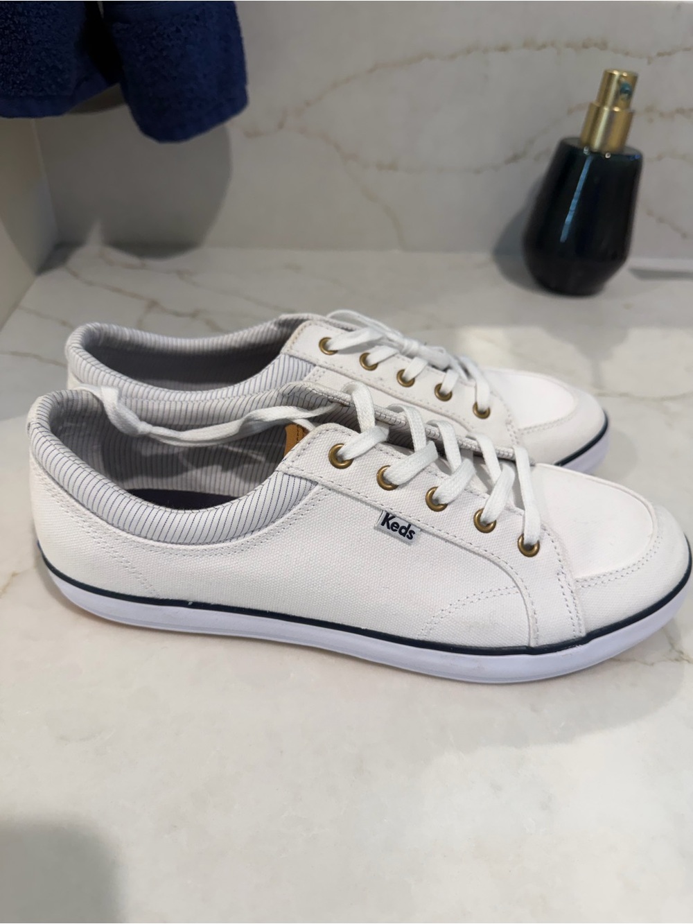 Keds White Canvas Low-Top Sneakers with Gold Eyelets